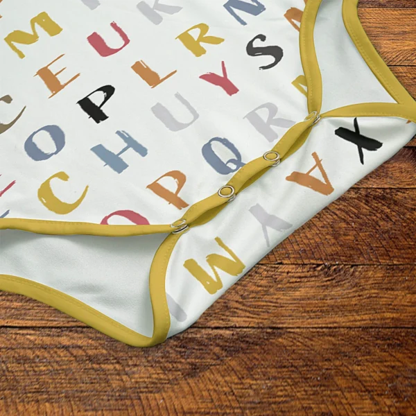 Alphabet Onesie Snaps Closeup Mockup V1