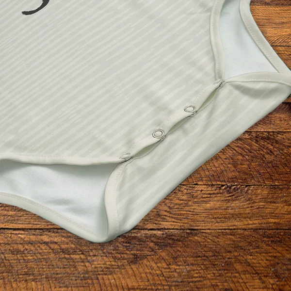 Lion Onesie Snaps Closeup Mockup V1