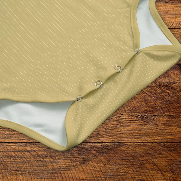 Yellow Onesie Snaps Closeup Mockup V1