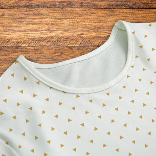 Gold Triangles White Onesie Closeup Mockup V1