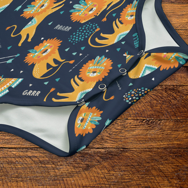 Lost Boy Lion Navy Onesie Snaps Closeup Mockup V1