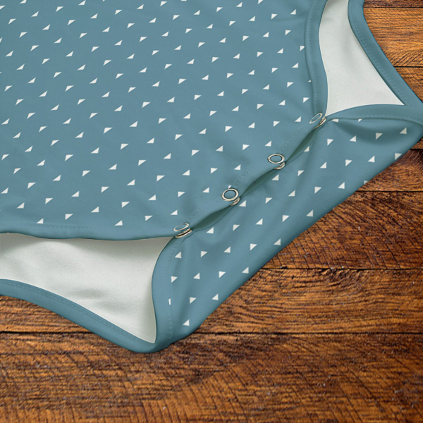 White Triangles Blue Onesie Snaps Closeup